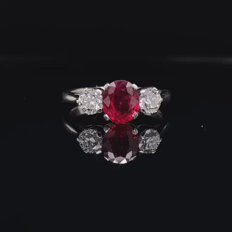 1.24ct Oval Ruby and Round Brilliant Cut Diamond Three Stone Ring