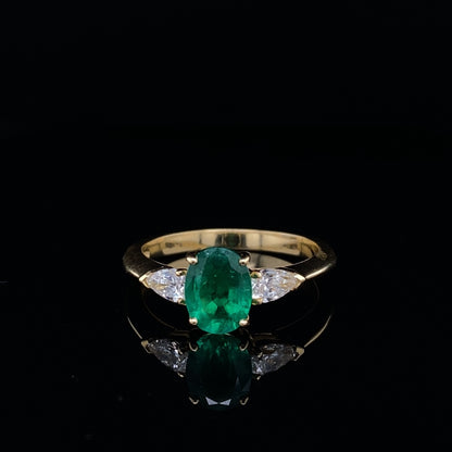 0.96ct Oval Emerald And Pear Cut Diamond Three Stone Ring