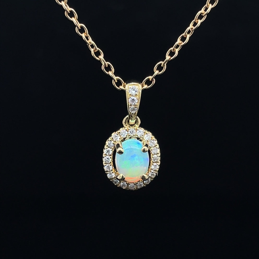 0.61ct Oval Opal And Diamond Cluster Pendant