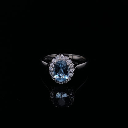 0.98ct Oval Aquamarine And Diamond Cluster Ring