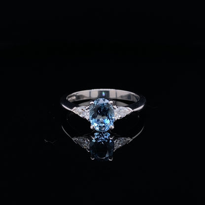 0.78ct Oval Aquamarine And Pear Cut Diamond Three Stone Ring