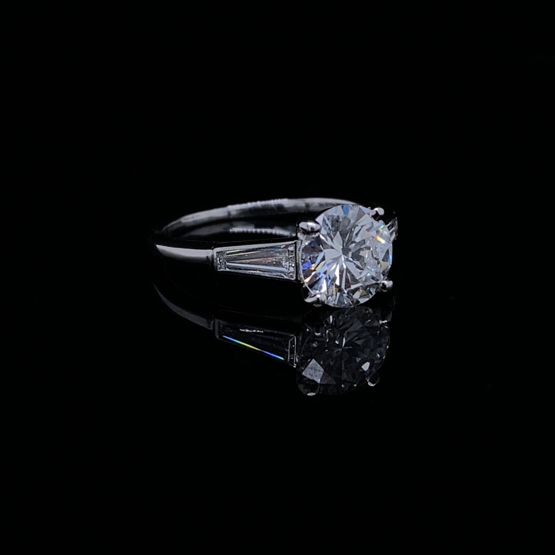 Cartier 1.37ct Round Diamond And Tapered Baguette Solitaire Ring