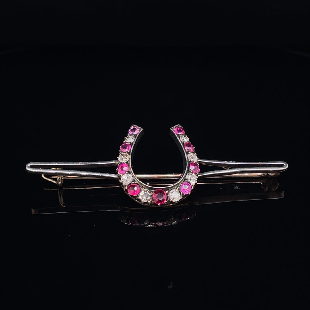Pink Sapphire and diamond horseshoe Brooch