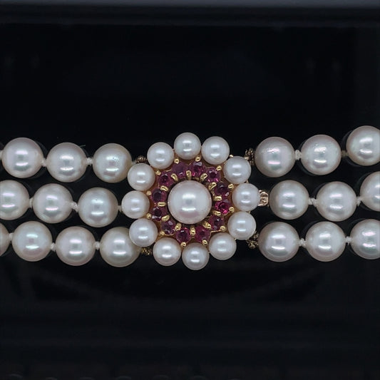 Three Row Pearl Choker Necklace With A Ruby Clasp