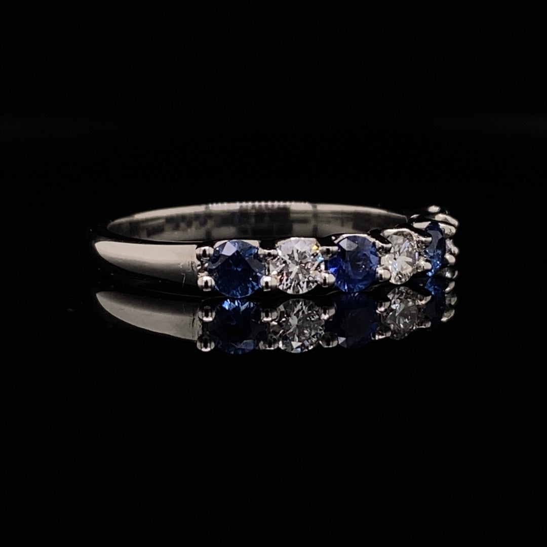 0.49ct Round Sapphire And Diamond Seven Stone Ring