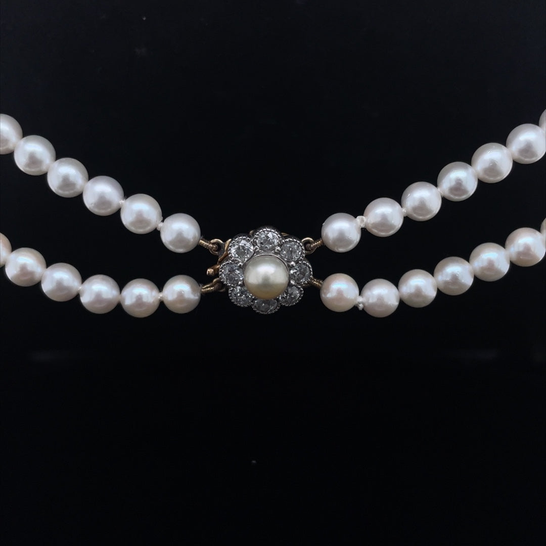Two Row Pearl Necklace With A Diamond Cluster Clasp
