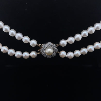 Two Row Pearl Necklace With A Diamond Cluster Clasp
