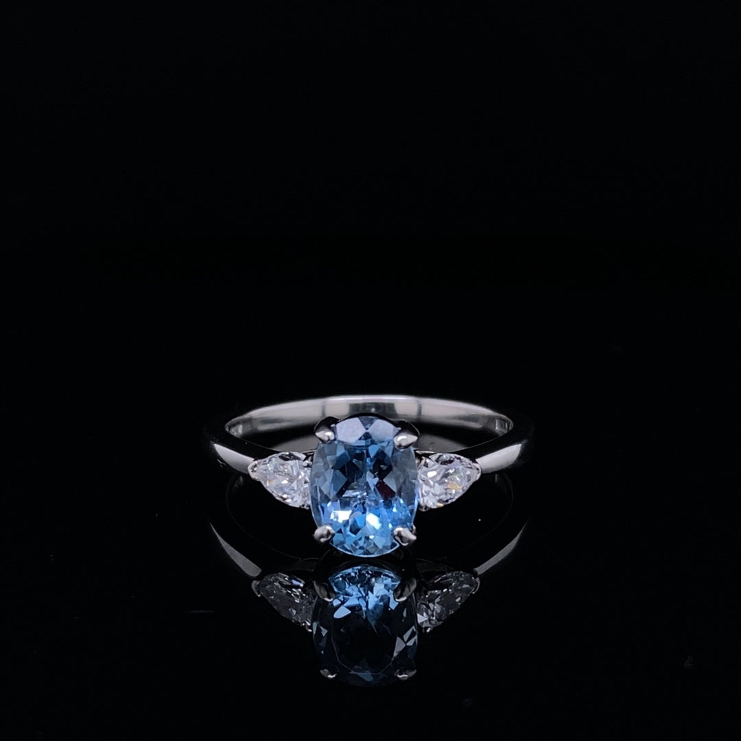 1.09ct Oval Aquamarine And Pear Cut Diamond Three Stone Ring