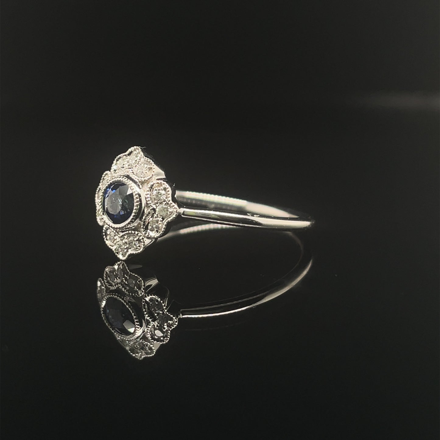 0.32ct Round Sapphire And Diamond Cluster Ring