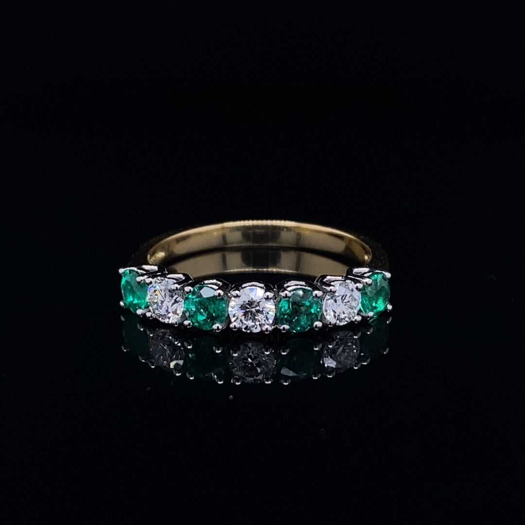 0.54ct Round Emerald And Diamond Seven Stone Ring