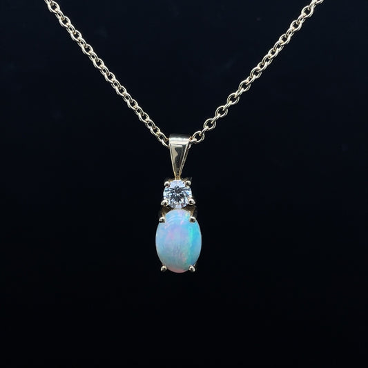 1.00ct Oval Opal And Round Diamond Top Pendant