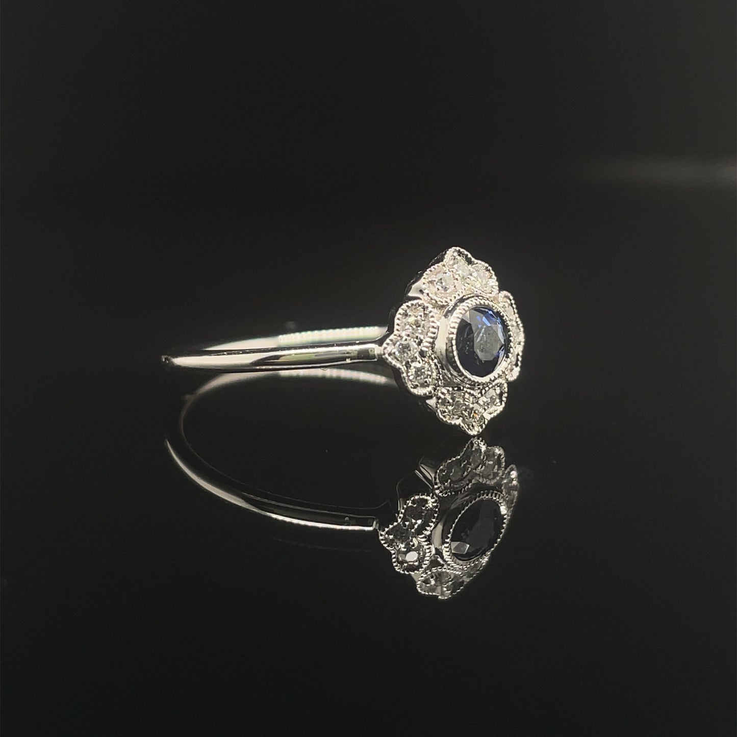 0.32ct Round Sapphire And Diamond Cluster Ring